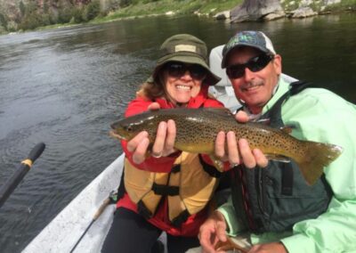 Couple displaying beautiful trophy Green River Trout