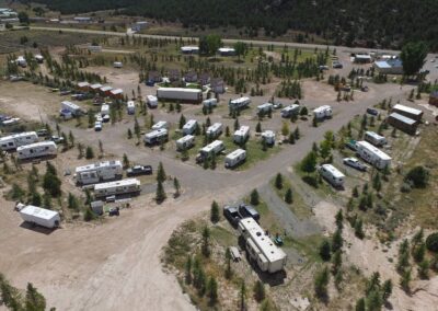 Dutch John Resort At Flaming Gorge RV-Park Aerial View Showing Campground RV Sites Tent Sites And Luxury Cabins.