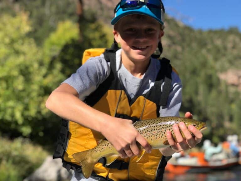 Green river trout fishing in a drift boat Dutch john resort fly fishing guides
