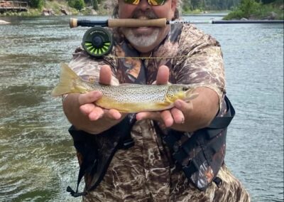 Green river trout fishing in a drift boat.