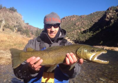 Guys holding a fish they just caught