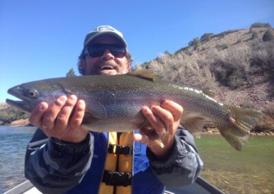 Guys holding a fish they just caught