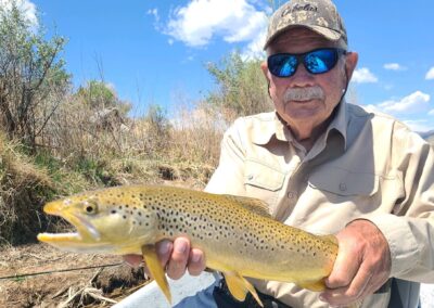 Guys holding a fish they just caught
