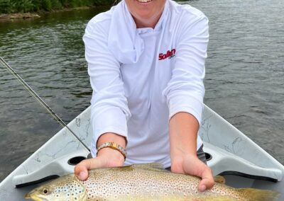 Guys holding a fish they just caught