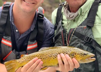 Guys holding a fish they just caught