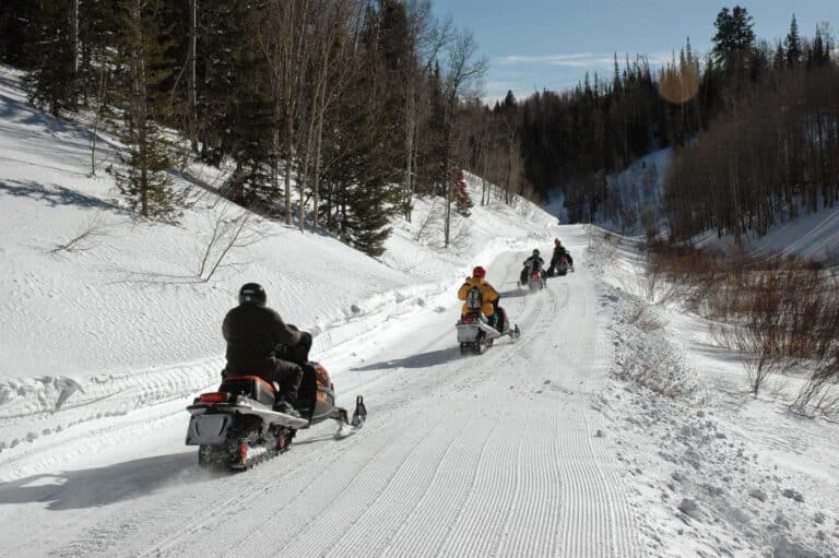 Snowmobiling on a winter trail near Dutch John Resort, Flaming Gorge
